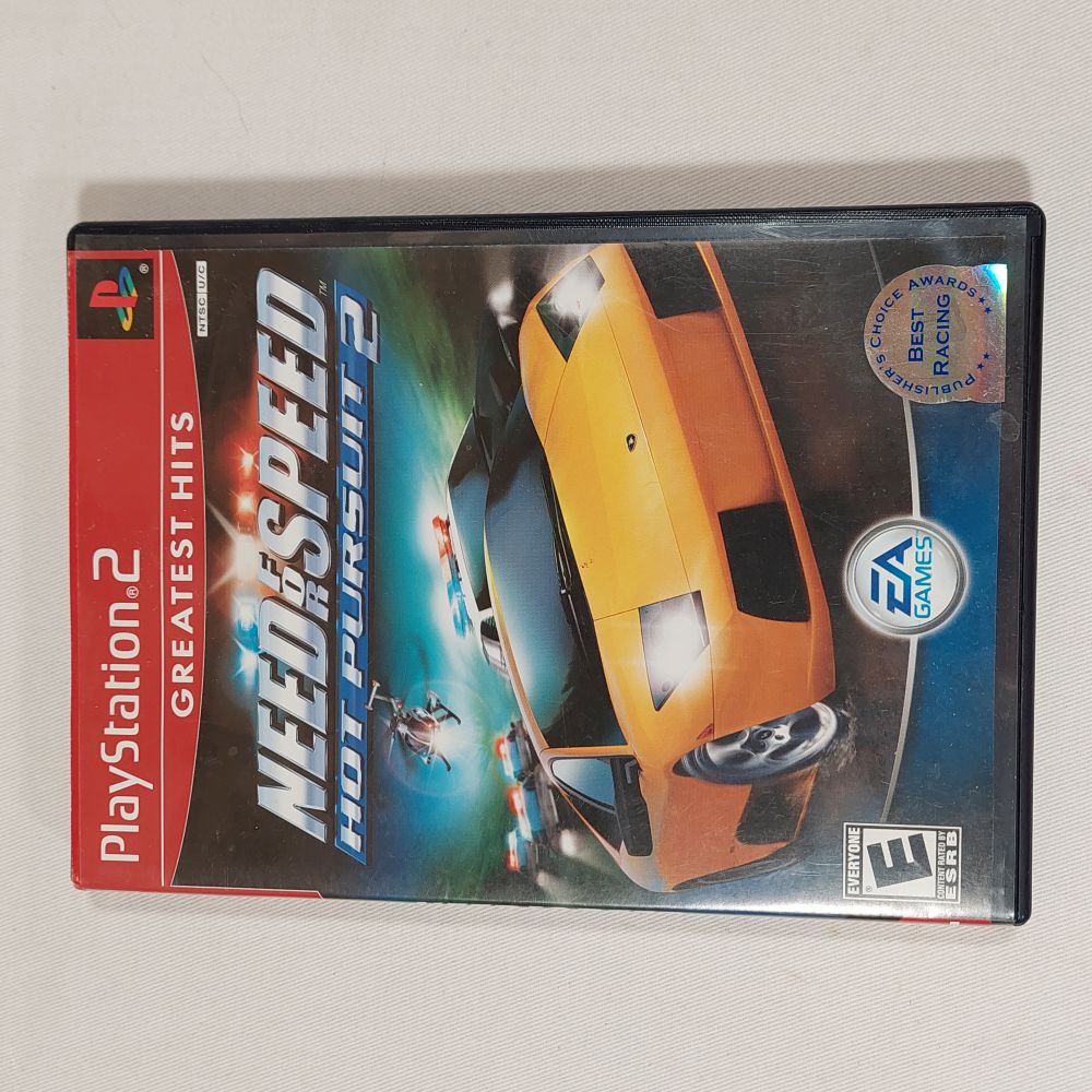 Need for Speed Hot Pursuit 2 is a PS2 car racing video game, not a realistic simulation but more of "arcade style" featuring exotic hig performance cars, police chases, etc. This is the front cover of the case which includes the DVD Rom.